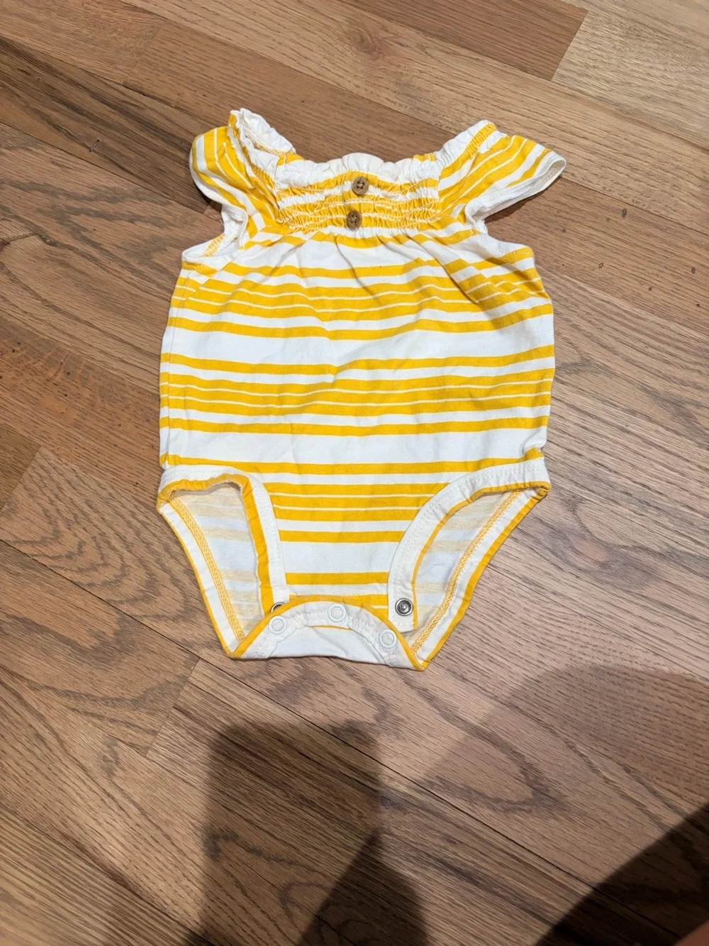 Carter’s baby girl gold stripe onesie with buttons